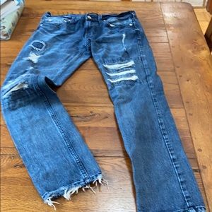 Men distressed jeans, lightly worn